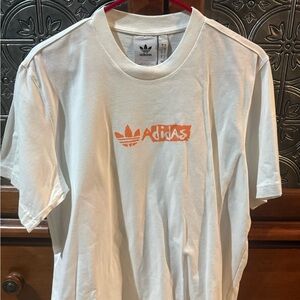 Adidas Men's Tee in White with Orange Logo